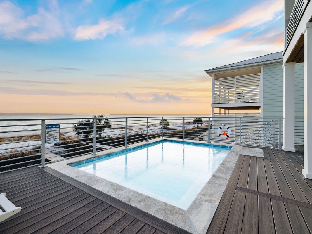 Dive into your private rooftop pool as sunset paints the sky in dreamy pastels, creating the perfect backdrop for evening swims.