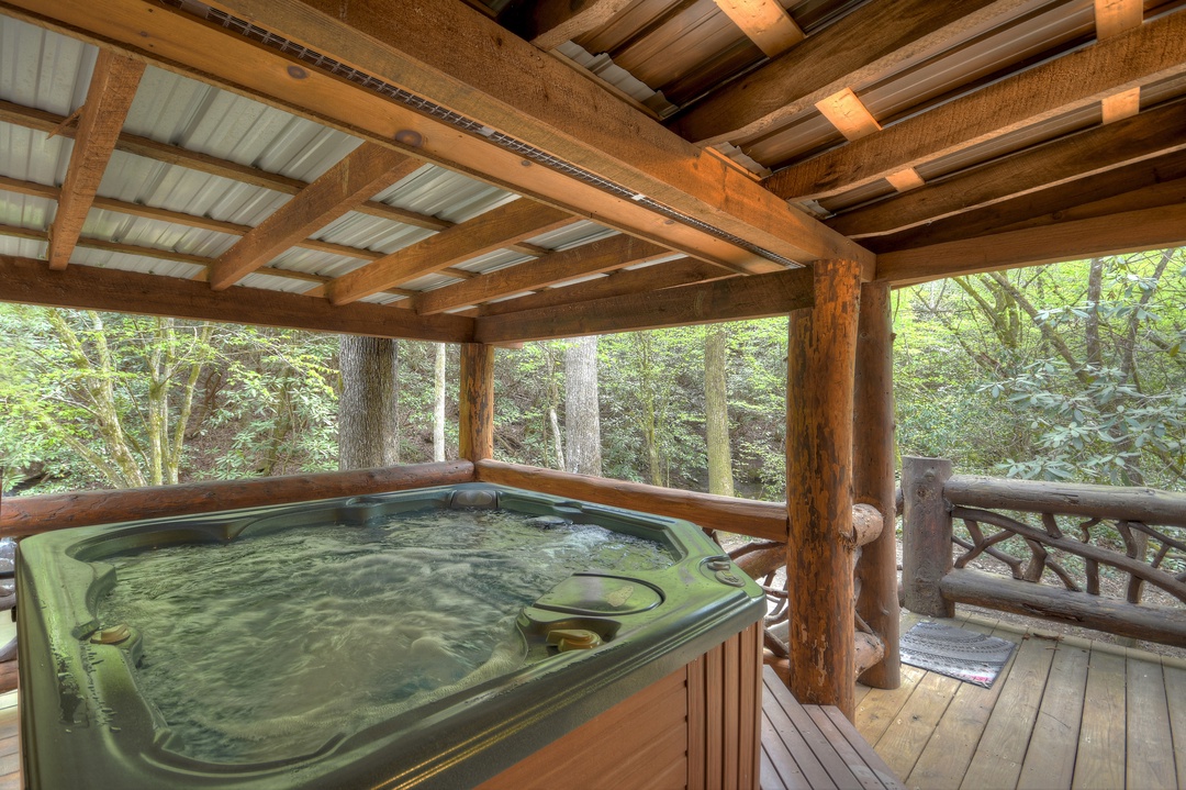 Hothouse Hideaway- Hot tub on the deck under cover