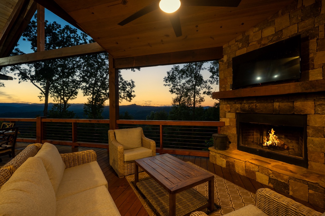 New Heights- Entry Level Outdoor Seating Area with Fireplace and TV