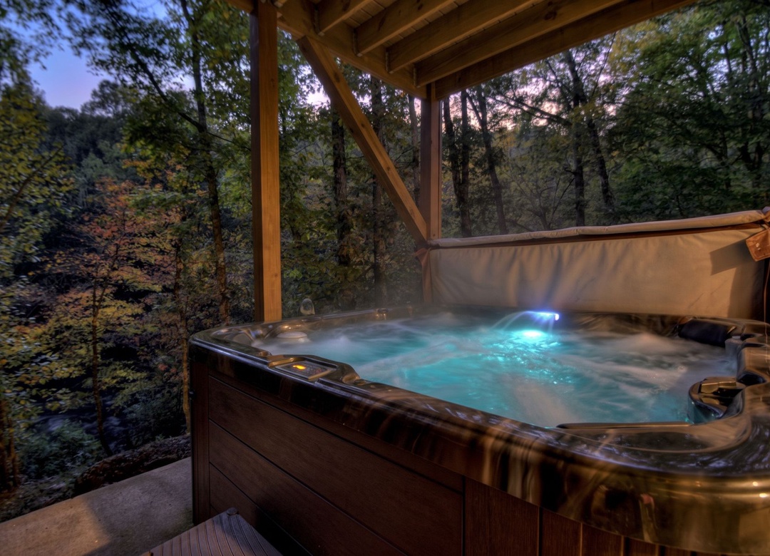 Private hot tub and watch the forest come alive at twilight