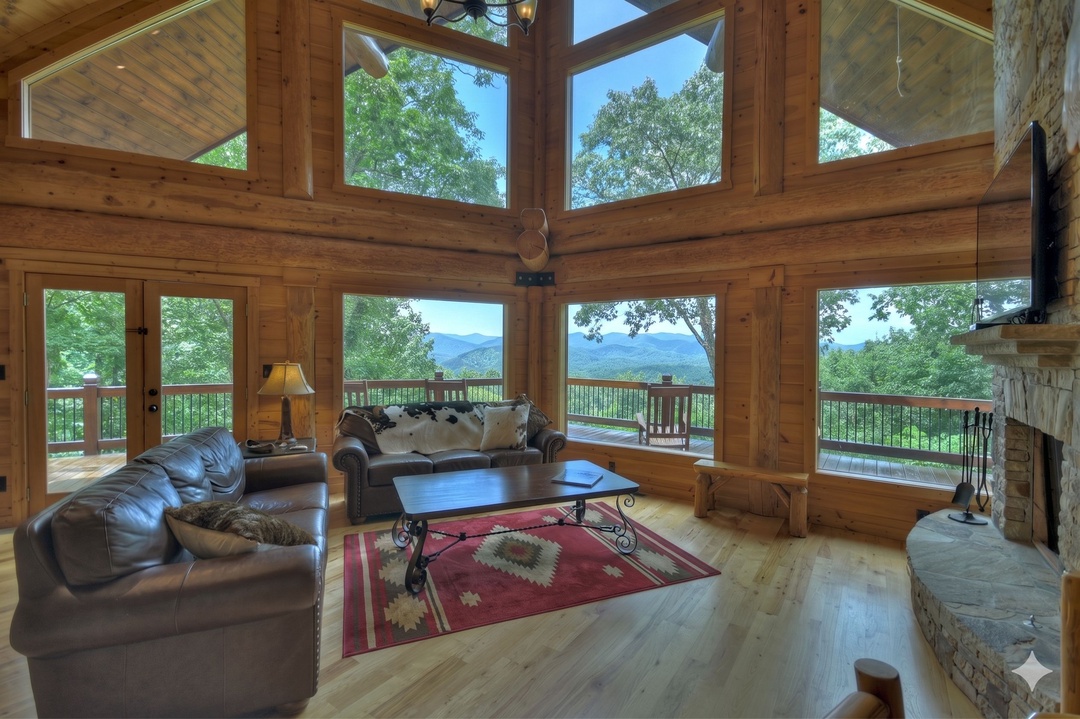 Saddle Lodge - Entry Level Living Room with Stacked Stone Fireplace