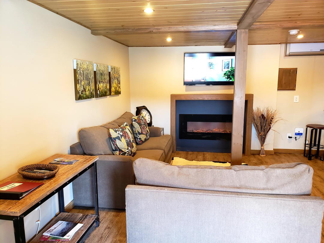 Main Street Suite- Living room area with lounge furniture