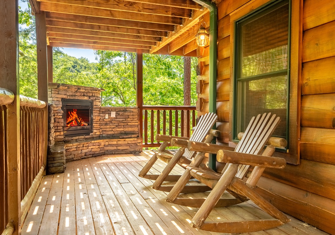 Picture yourself relaxing in one of these rustic rocking chairs on your private covered balcony, surrounded by lush forest views and warmed by your own outdoor fireplace.