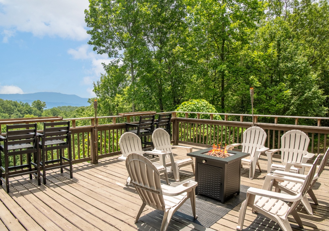 Gather around the fire pit on your private deck, surrounded by towering trees and mountain views. Perfect for evening conversations under the stars or morning coffee with nature as your backdrop.