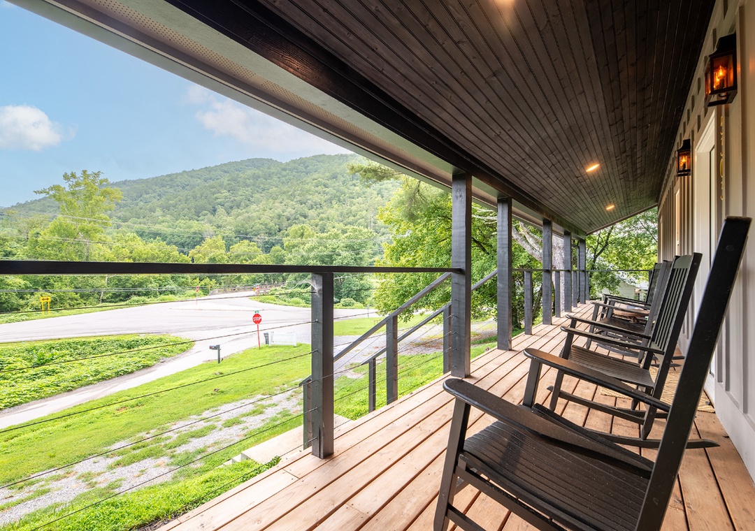 Settle into your rocking chair and soak in peaceful mountain views from this covered porch—your perfect spot for morning coffee or evening relaxation.