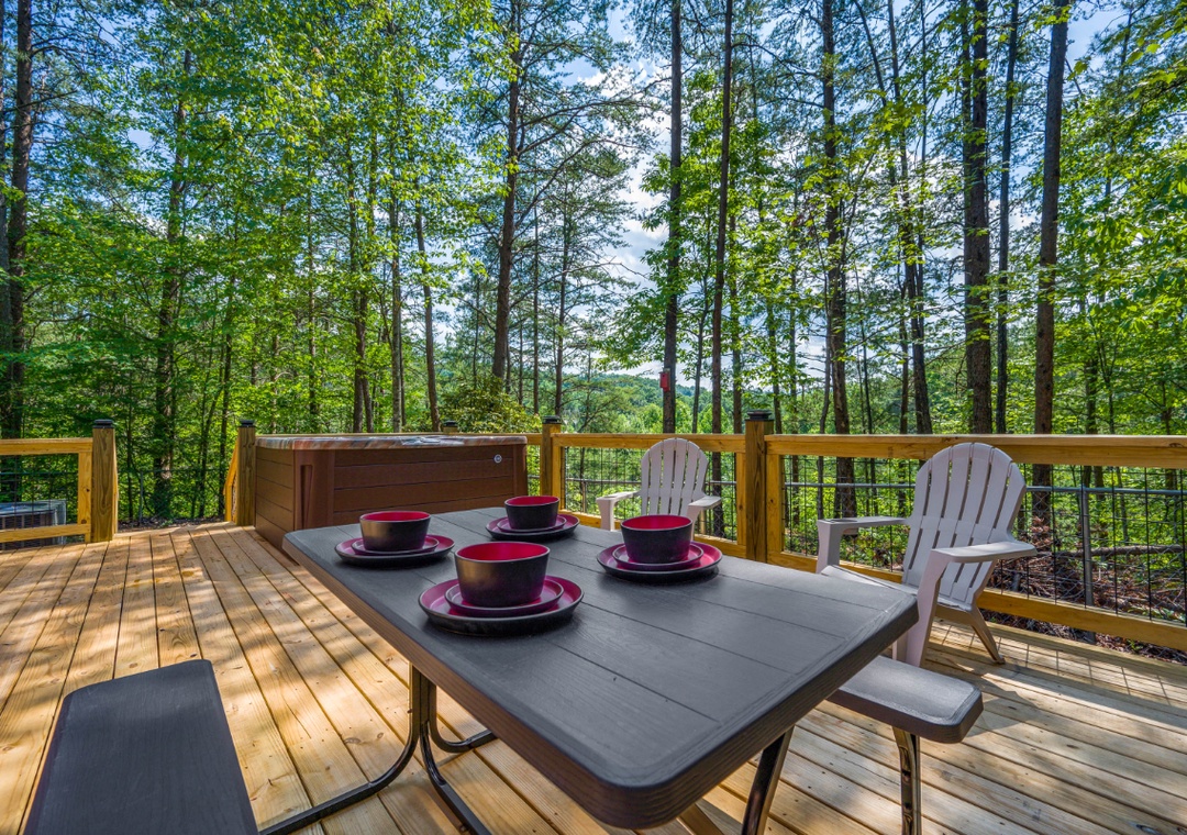 Enjoy morning coffee on your private forest deck, surrounded by towering trees and peaceful woodland views.