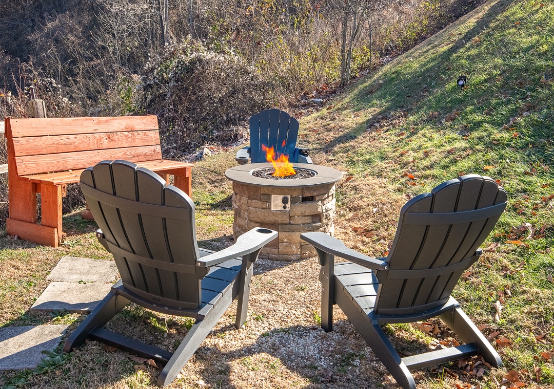 Gather around the crackling fire pit for cozy evenings under the stars, with comfortable seating perfect for roasting marshmallows.