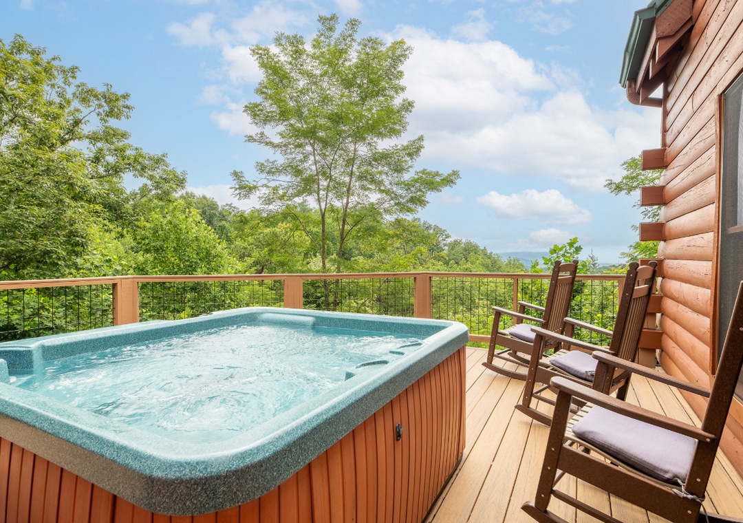 Soak in your private hot tub while gazing at lush forest views stretching to the horizon. Perfect for unwinding after a day of adventure.