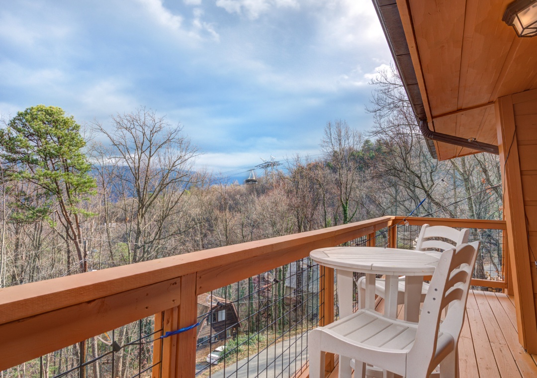 Sip your morning coffee while soaking in stunning mountain views from your private balcony, surrounded by peaceful forest canopy.