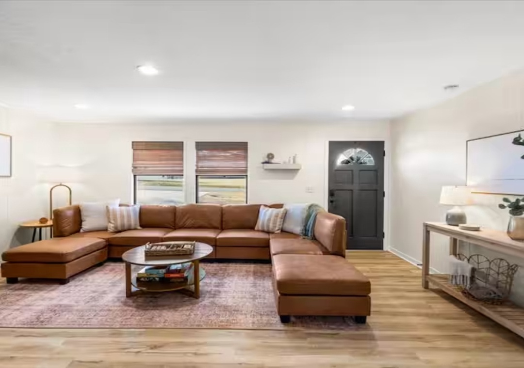 Sink into this spacious leather sectional where you can unwind with a book or gather for movie nights in your beautifully appointed living space.