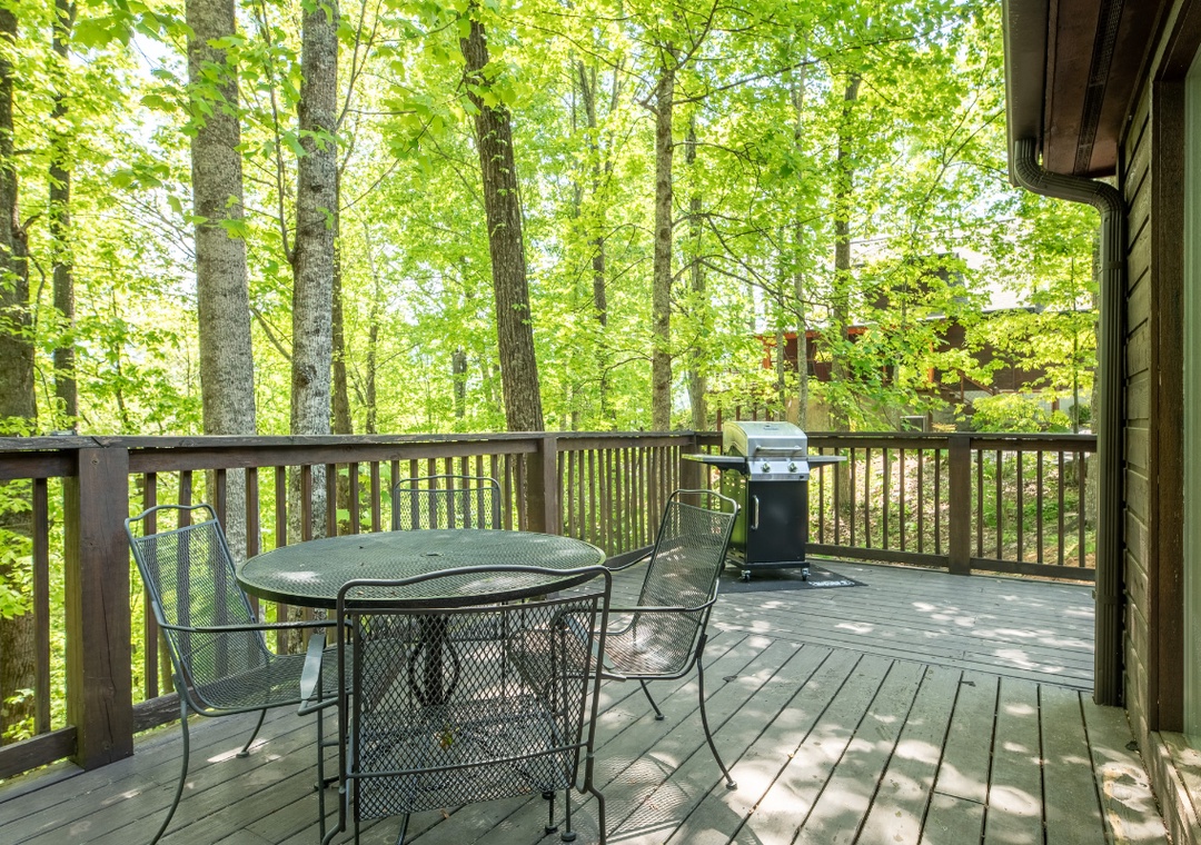 Step onto your private deck surrounded by towering trees. Enjoy morning coffee or evening barbecues in this peaceful woodland retreat.