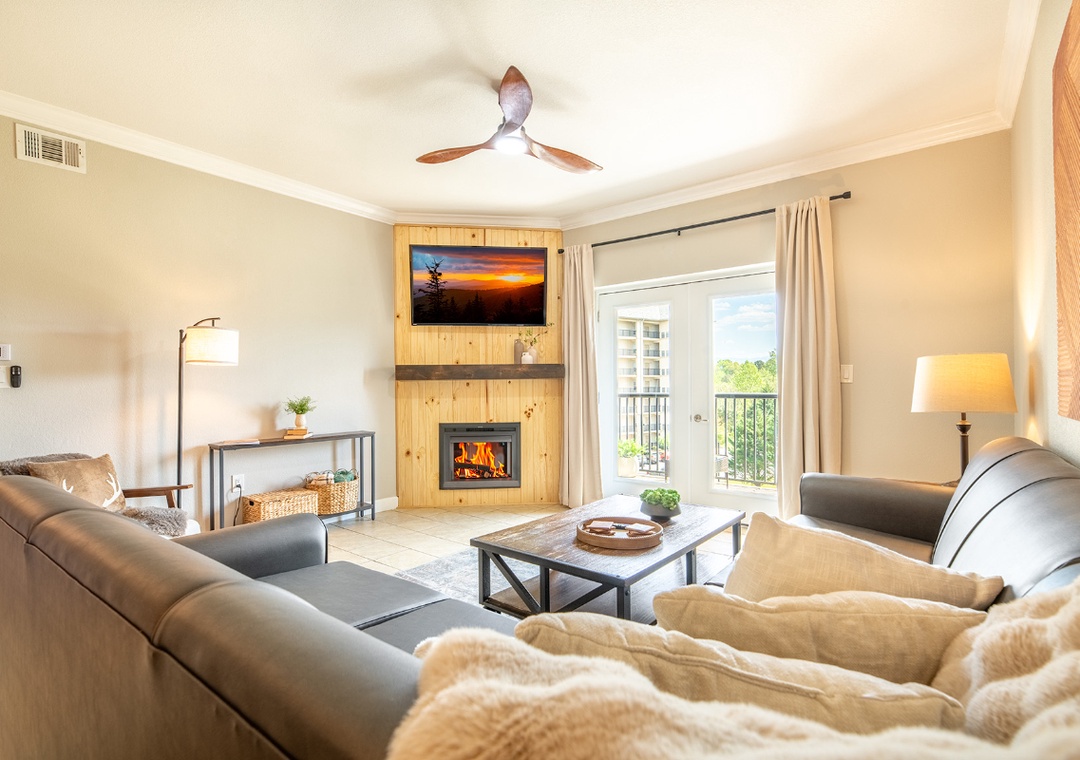 Cozy up by your crackling fireplace in this inviting living room, with plush seating and warm lighting creating the perfect retreat.