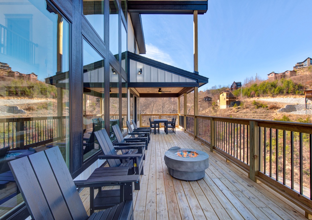 Your private deck invites relaxation with comfortable seating and a fire pit for memorable evenings under the open sky.