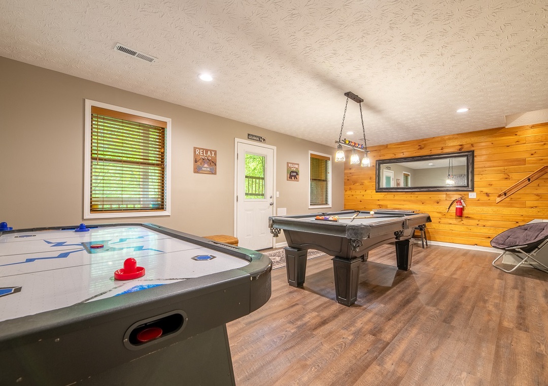 Challenge your friends to a friendly match on the full-size pool table or test your skills at air hockey in your own private game room.