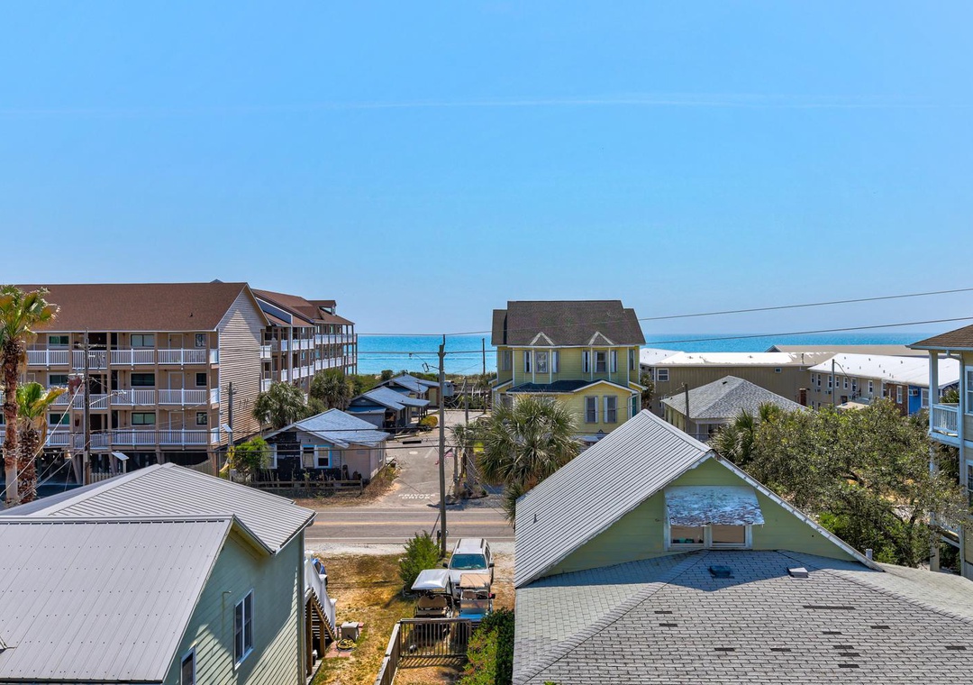 Coastal neighborhood with charming beach houses and ocean views just steps from the shore.