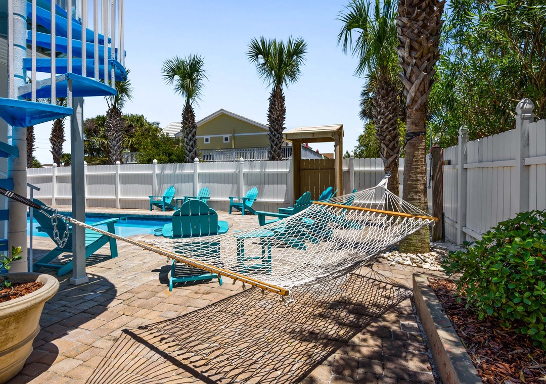 Relax in the poolside hammock
