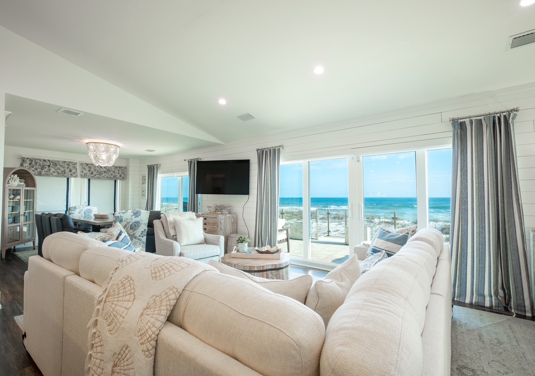 Living room with floor-to-ceiling Gulf views