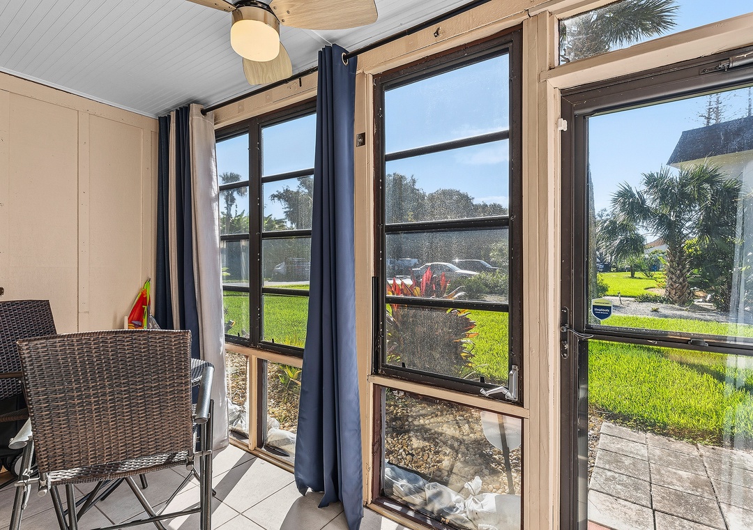 Relax in the sunshine on the screened in patio
