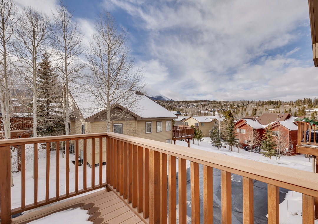 Step onto your private balcony and breathe in crisp mountain air while gazing at snow-dusted peaks and alpine homes.