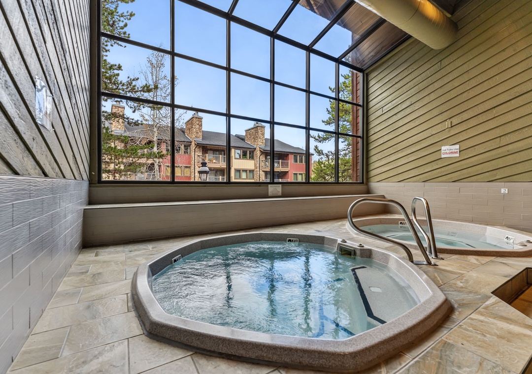 Sink into the soothing waters of the hot tub beneath soaring windows and an airy skylight—your perfect spot to unwind after a day of adventure.