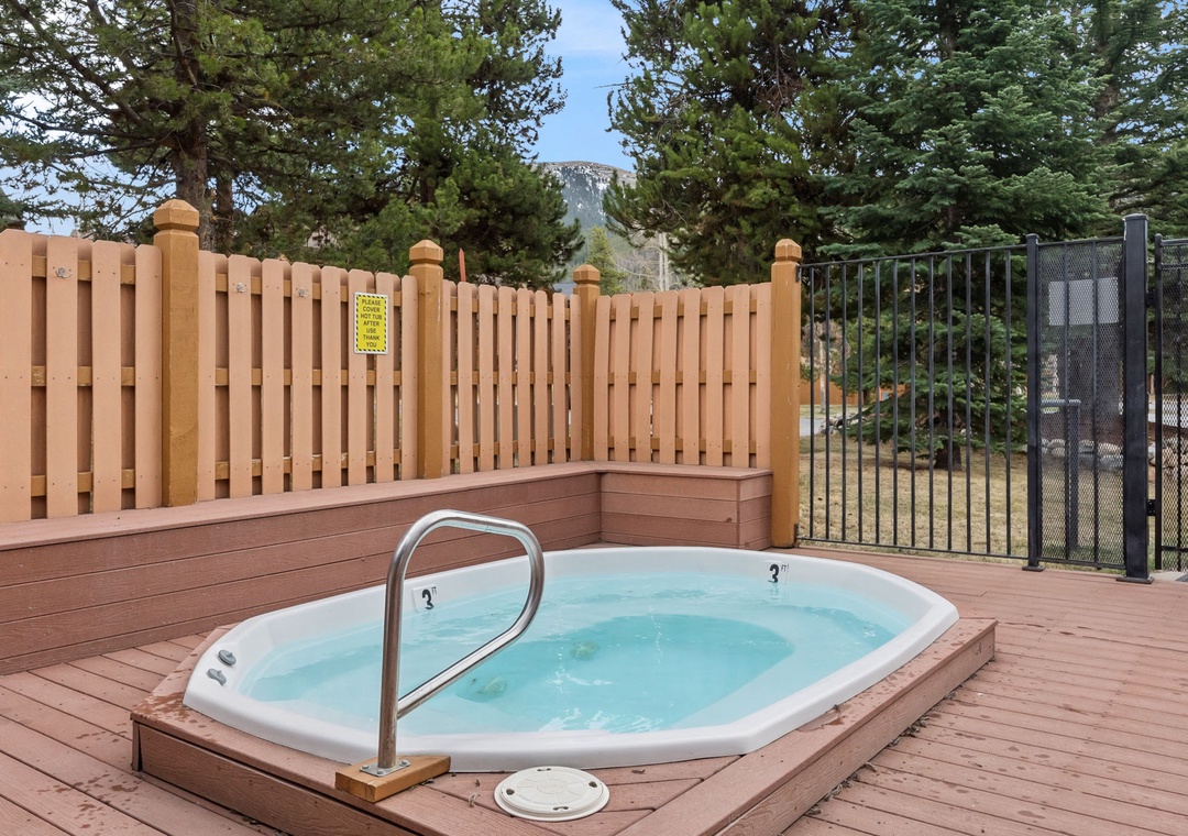 Relax and enjoy the complex hot tub just steps from the condo