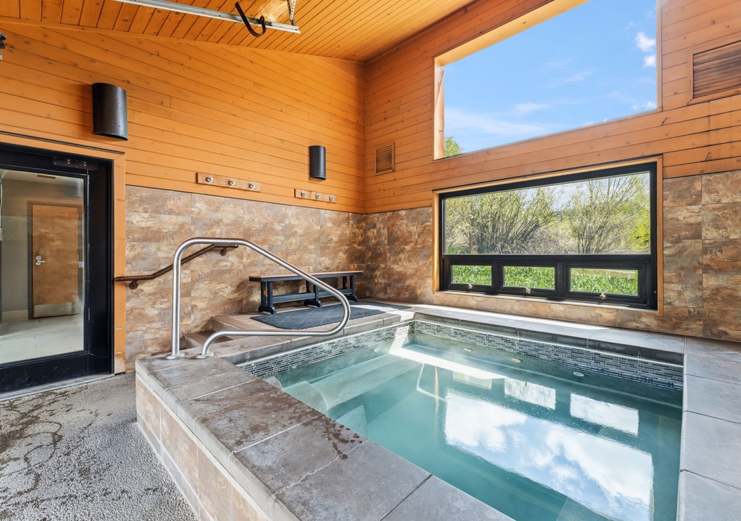 Relax and recharge in the indoor hot tub, a welcoming retreat after a day on the slopes, mountain trails, or any Summit County adventure.