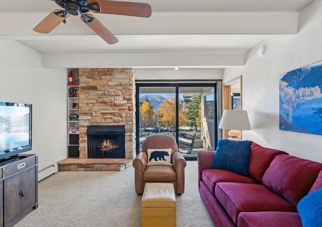 Settle in and watch the fire crackle as mountain views frame your beautiful escape through floor-to-ceiling windows.