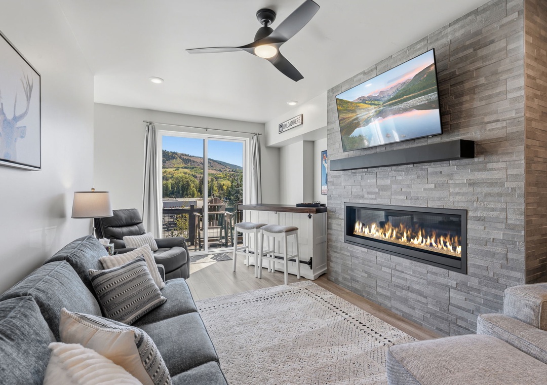 Bright living space featuring a 55