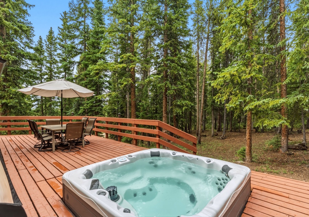 Step onto the deck surrounded by towering pines, where your private hot tub awaits. Unwind in the bubbling warmth, dine al fresco, and breathe in the fresh mountain air.