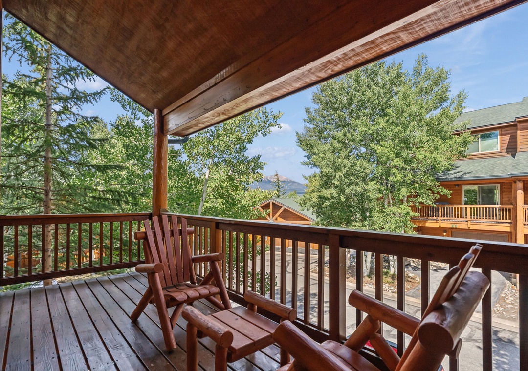 Settle into your private balcony and soak in peaceful mountain views framed by towering trees—your perfect spot for morning coffee or evening reflection.
