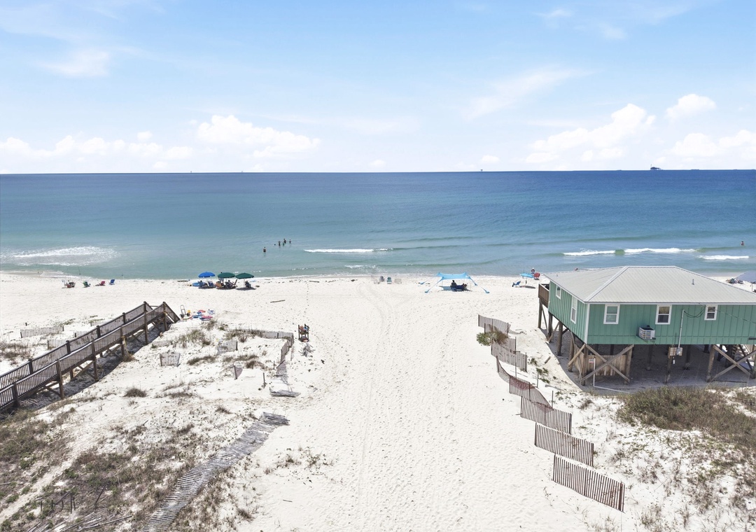 Less than a mile to public beach access!