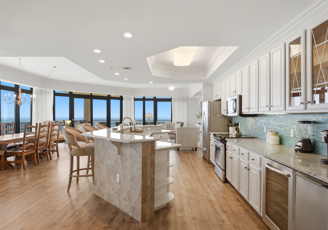 Open concept kitchen, living and dining