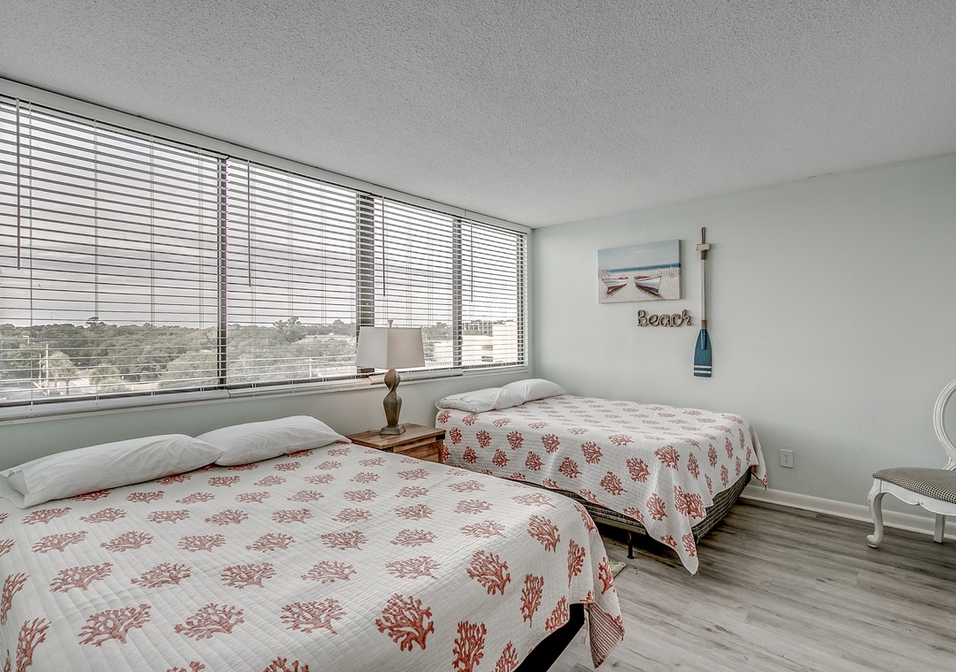Guest bedroom 1 with two queen beds
