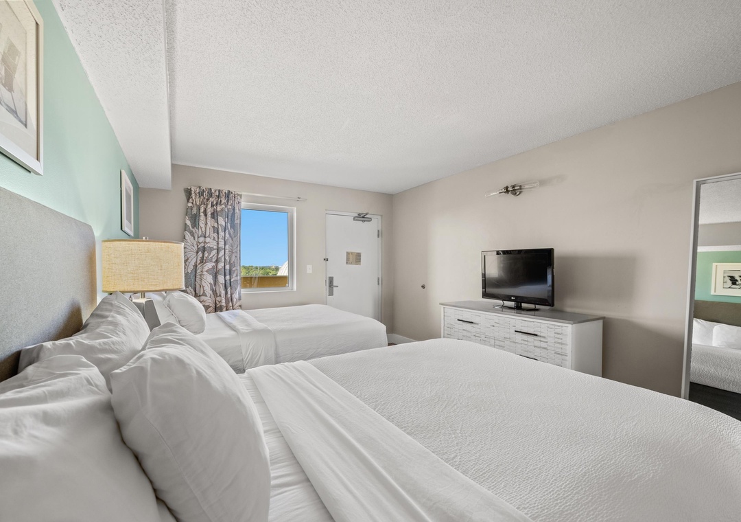 Crisp linens and plush pillows—sink in and recharge