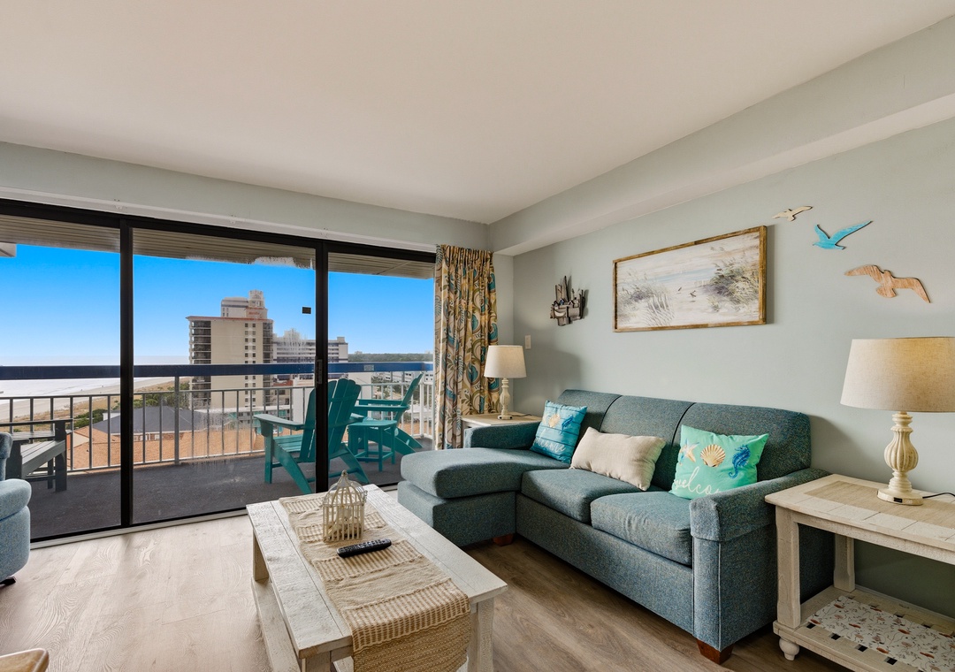 Sink into plush seating while ocean waves.