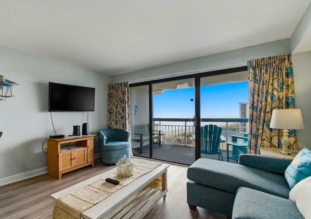 Sink into plush seating while ocean waves.