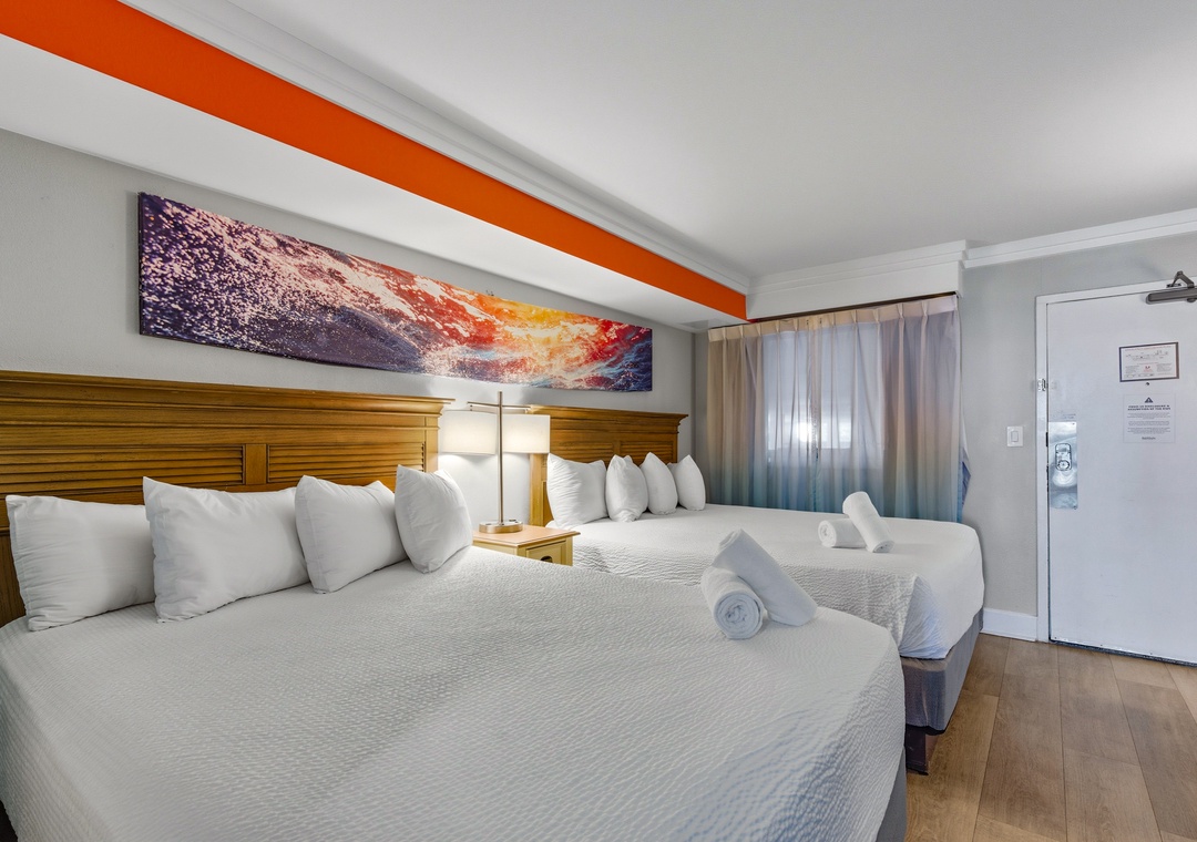 Primary bedroom with double beds