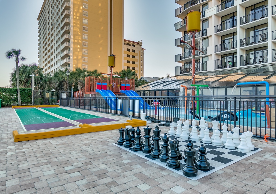 Life-size chess on the pool deck