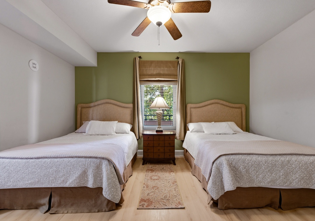 Guest bedroom with two queen beds