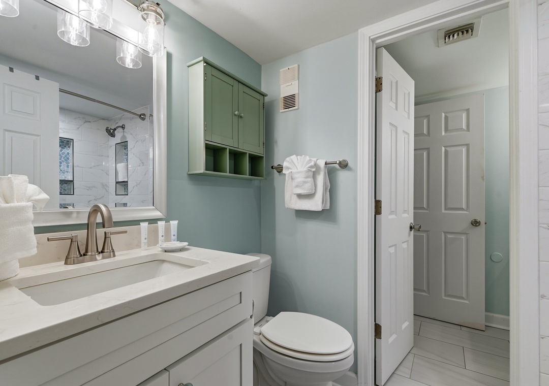 Bathroom — bright vanity + plenty of room