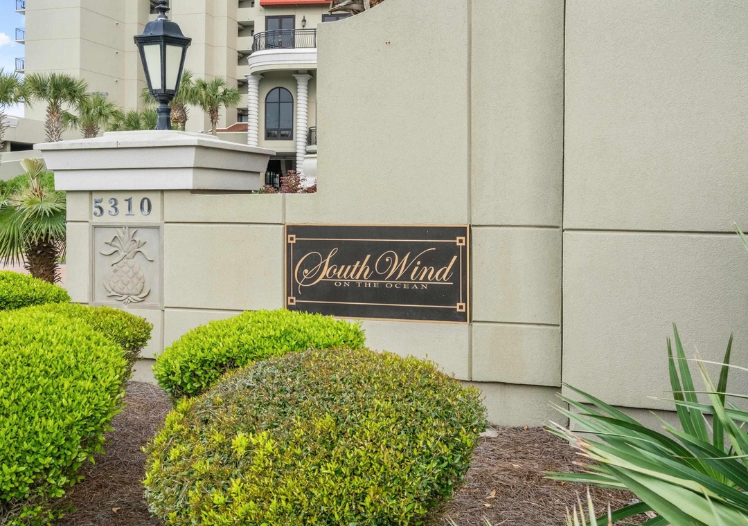 Welcome to your oceanside retreat! You'll love the elegant entrance with tropical landscaping that sets the tone for your coastal getaway. The manicured gardens and palm trees create a resort-like atmosphere.