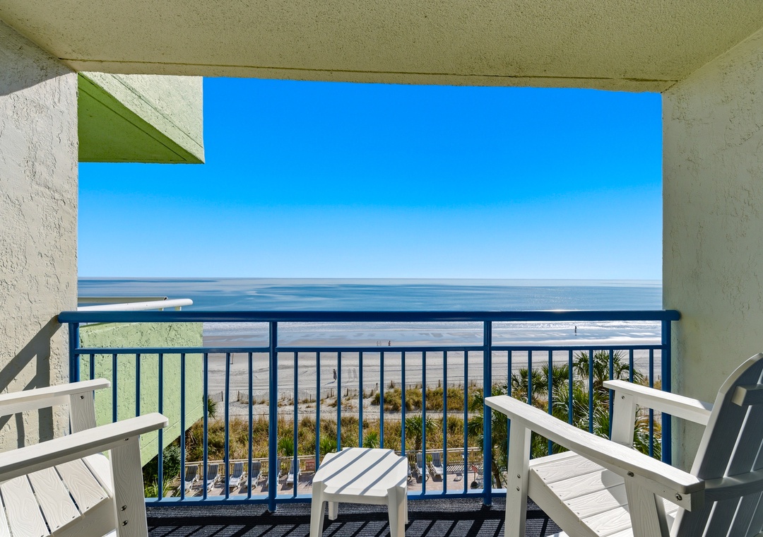 Relax in comfortable seating while the sound of waves sets the perfect backdrop for your getaway.