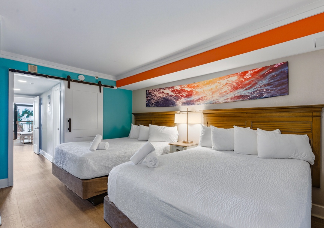 Primary bedroom with double beds