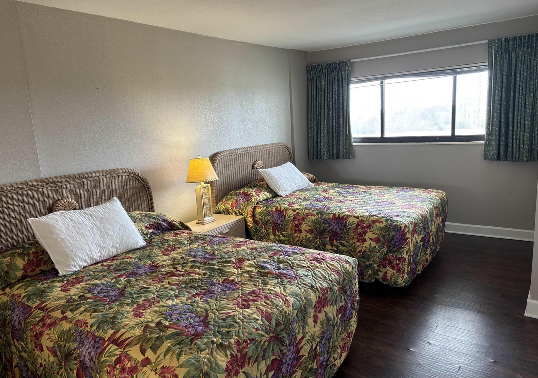 Guest bedroom with two queen beds