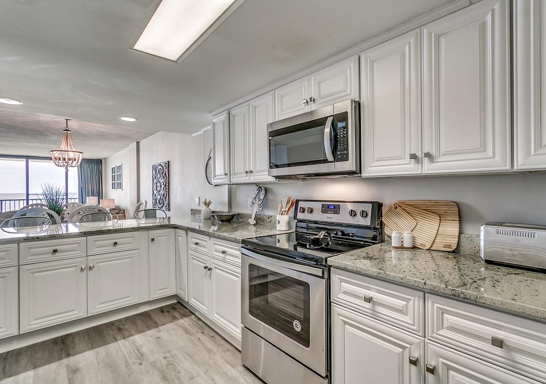 Kitchen has stainless steel applianes