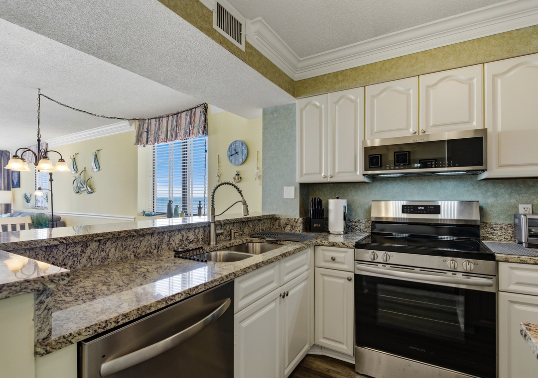 Kitchen has stainless steel appliances