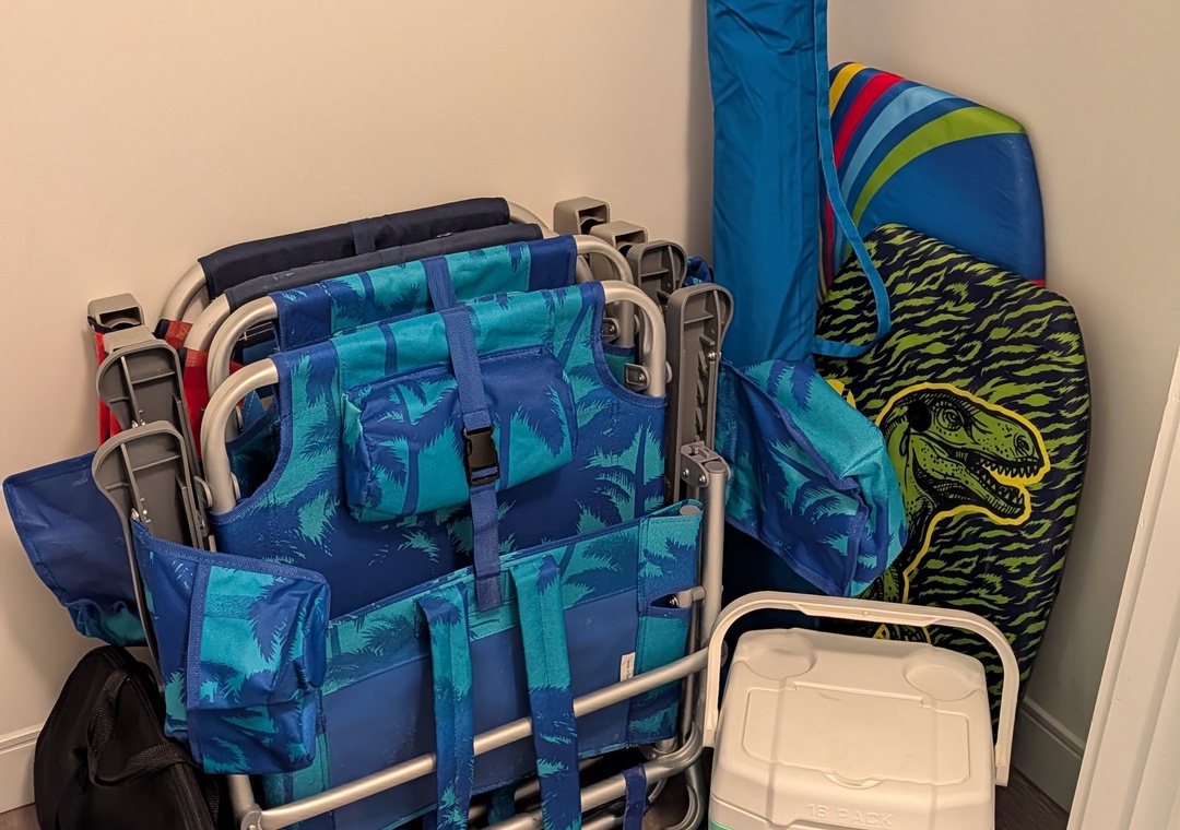 4 Beach chairs, umbrella, cooler and boogie board ready for fun!