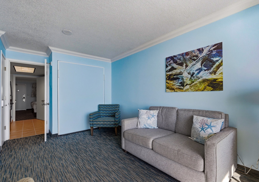 Sink into plush seating while ocean waves.