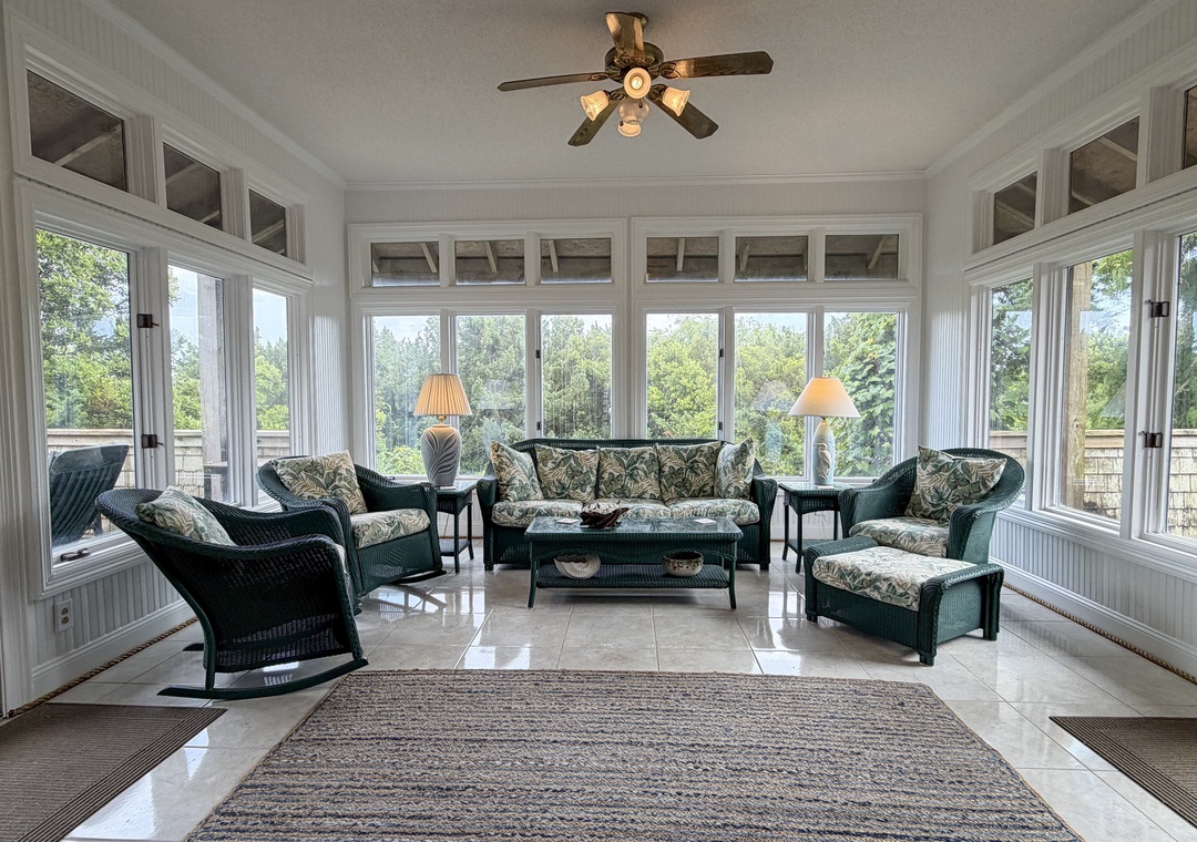 Sunroom with TV and Deck Access