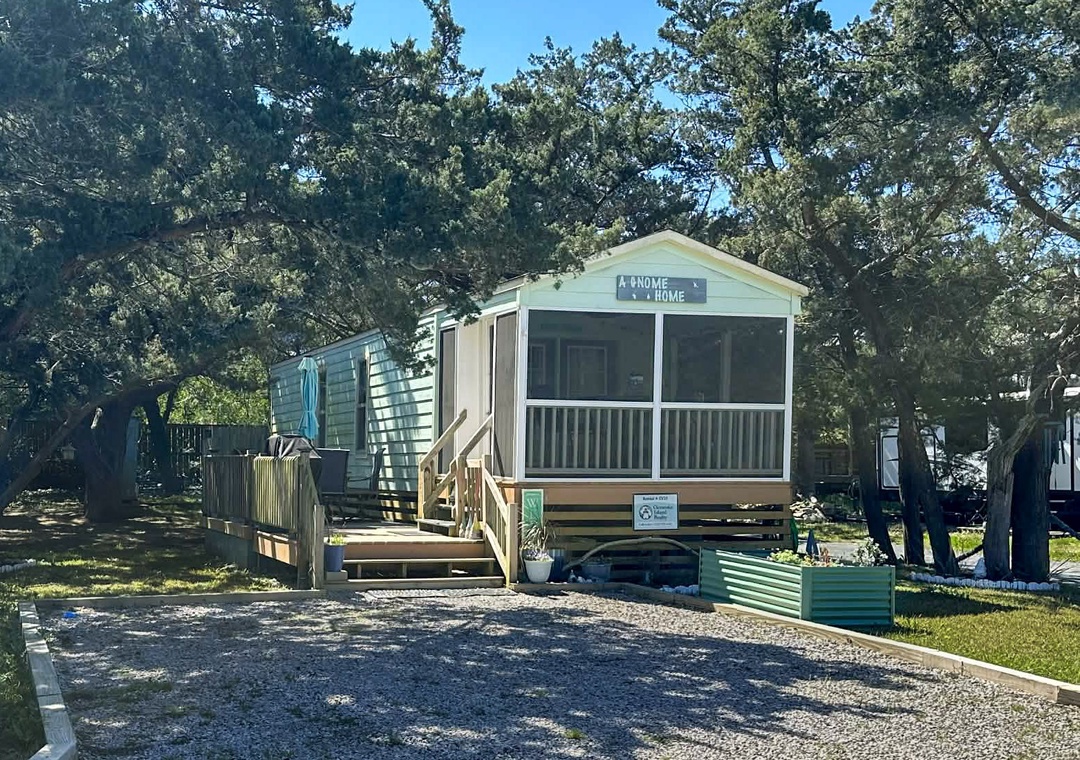 A Gnome Home with 2 vehicle parking